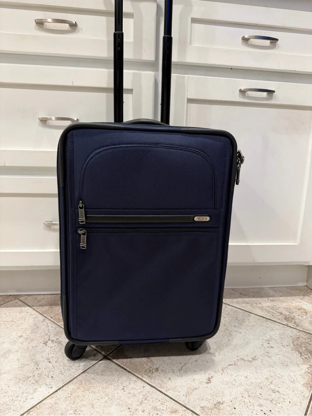 Tumi Navy Softside Carry-On Spinner